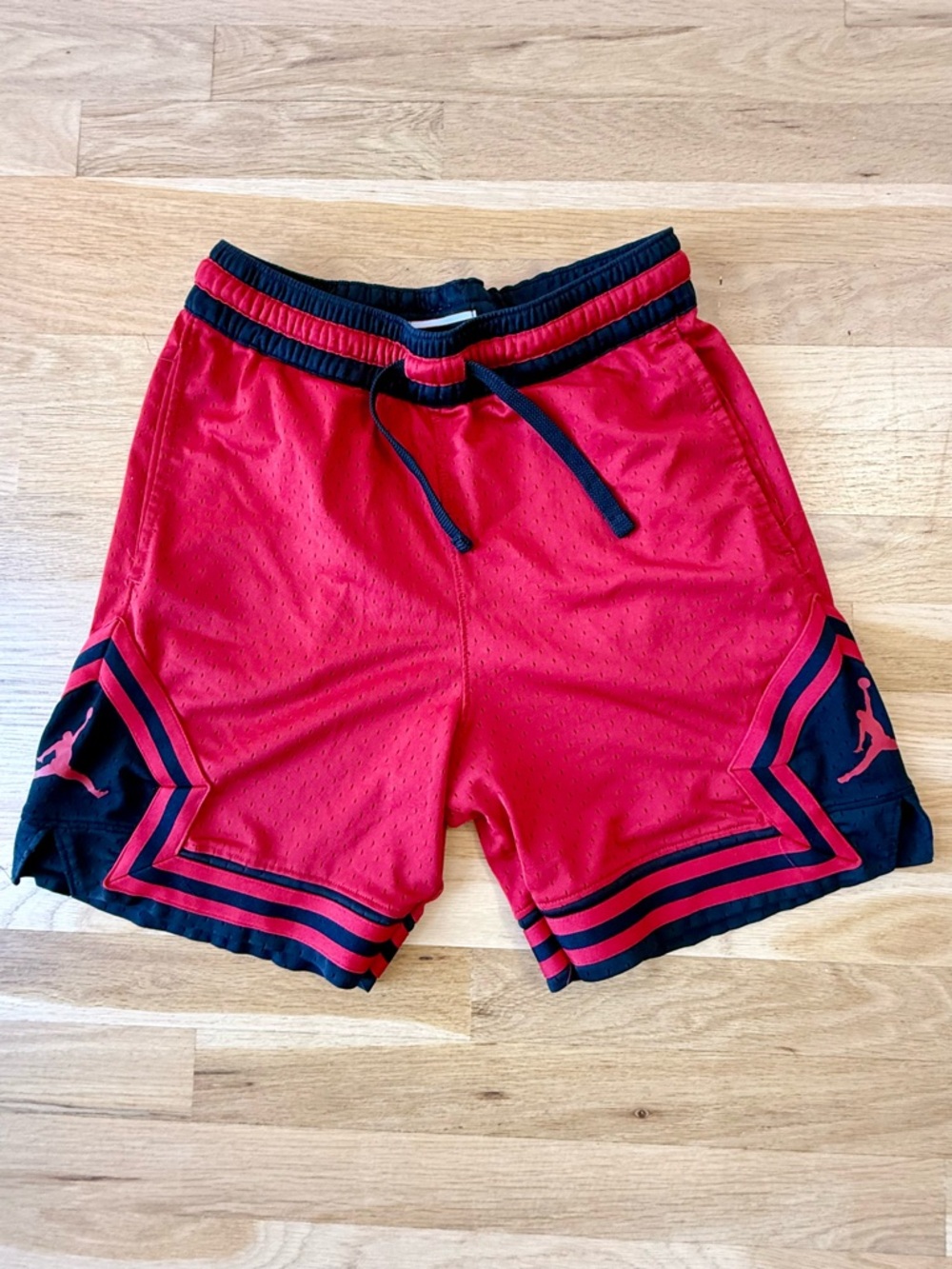 Red Jordan Basketball Shorts with Black Trim